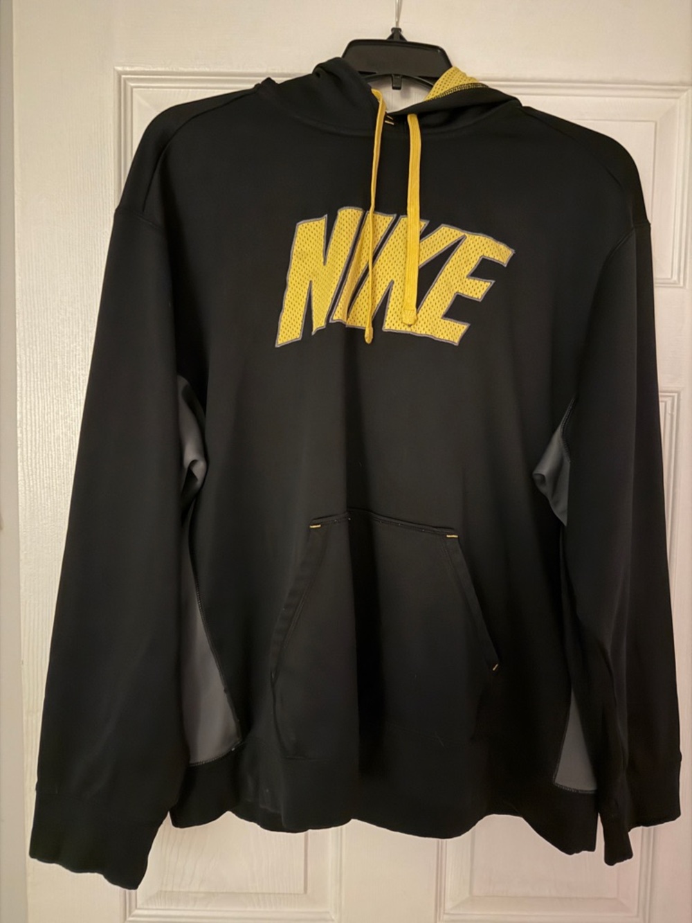 Nike Black Hoodie with Yellow Logo and Drawstrings